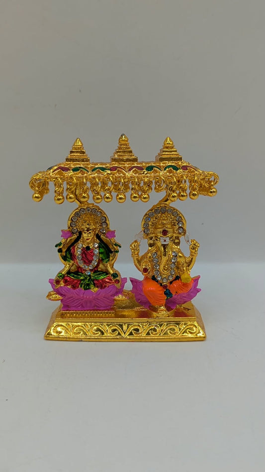 Gold Laxmi Ganesh murti with canopy, front view