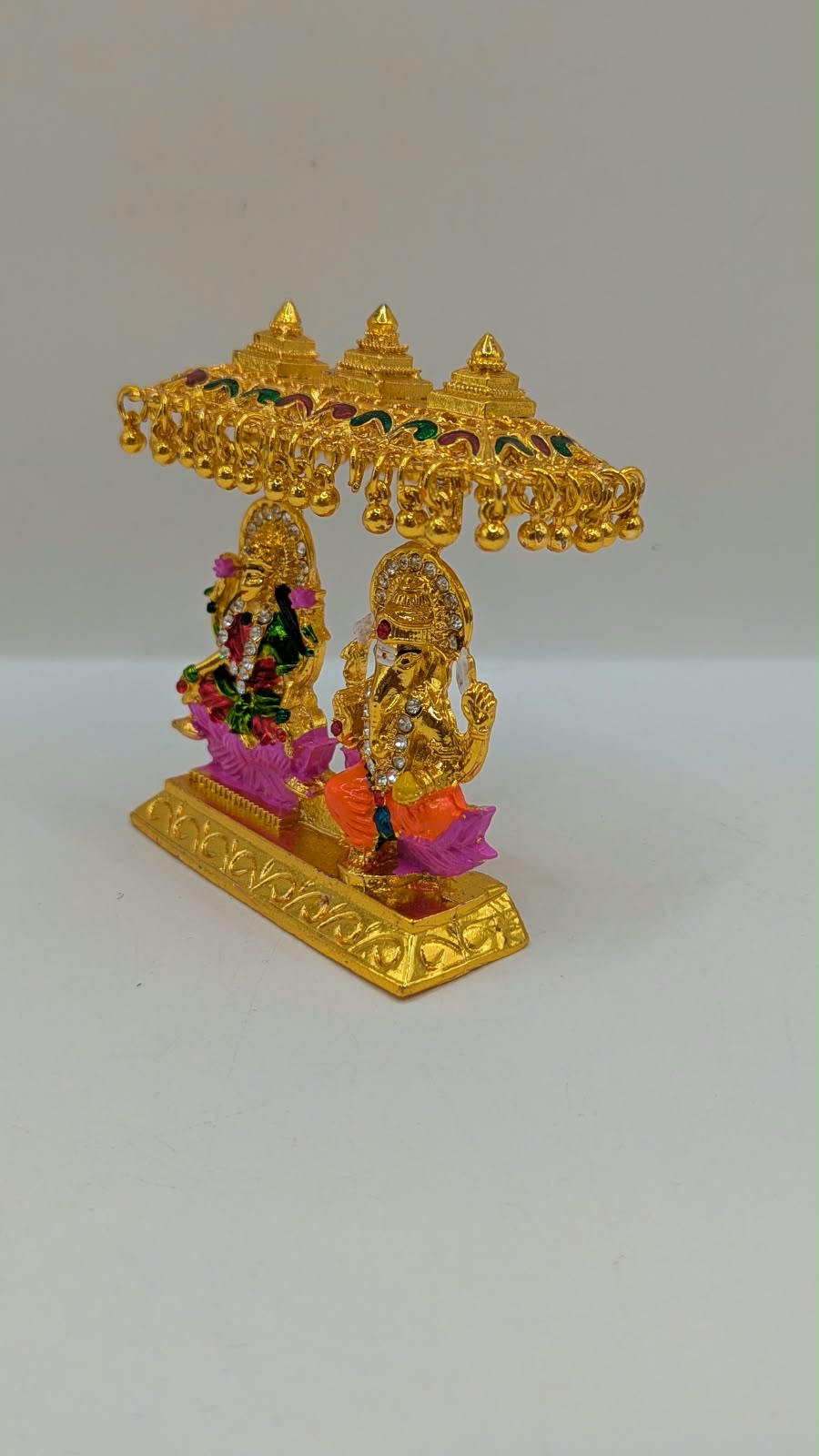 Gold Laxmi Ganesh murti with canopy, other side view