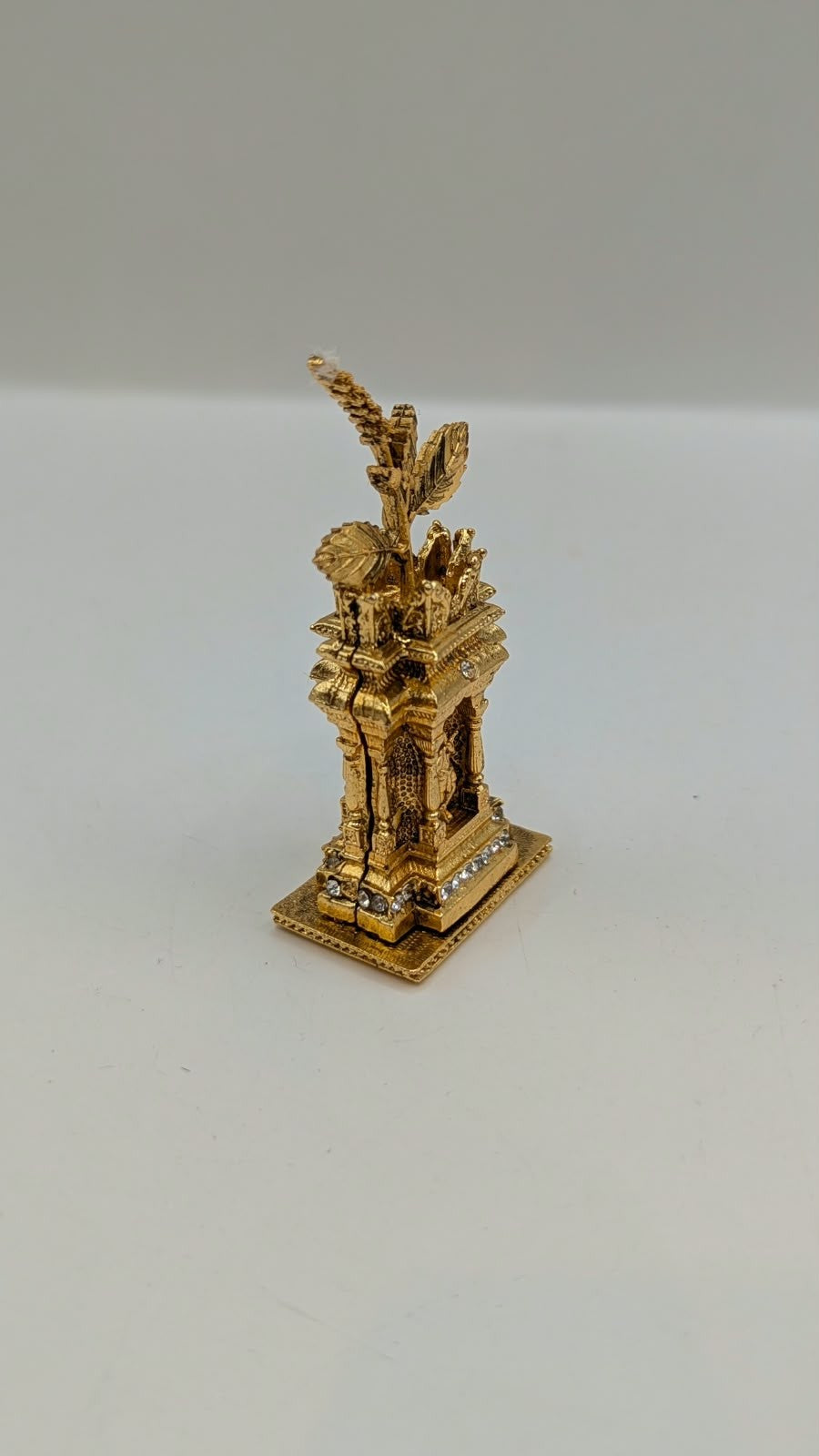 Gold Tulsi Vrindavan murti with Krishna, side view