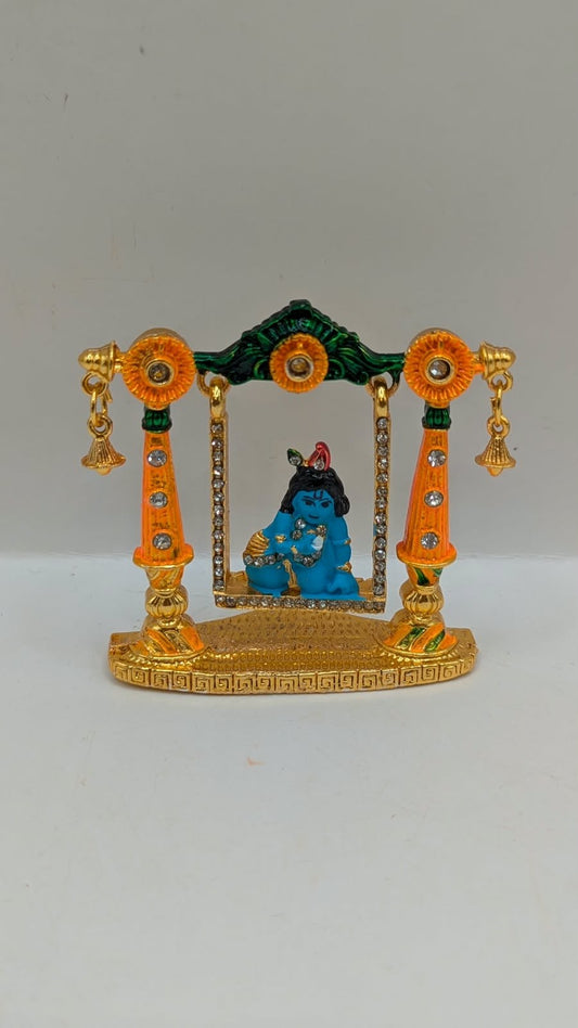 Bal Gopal on gold and orange jhula murti, front view