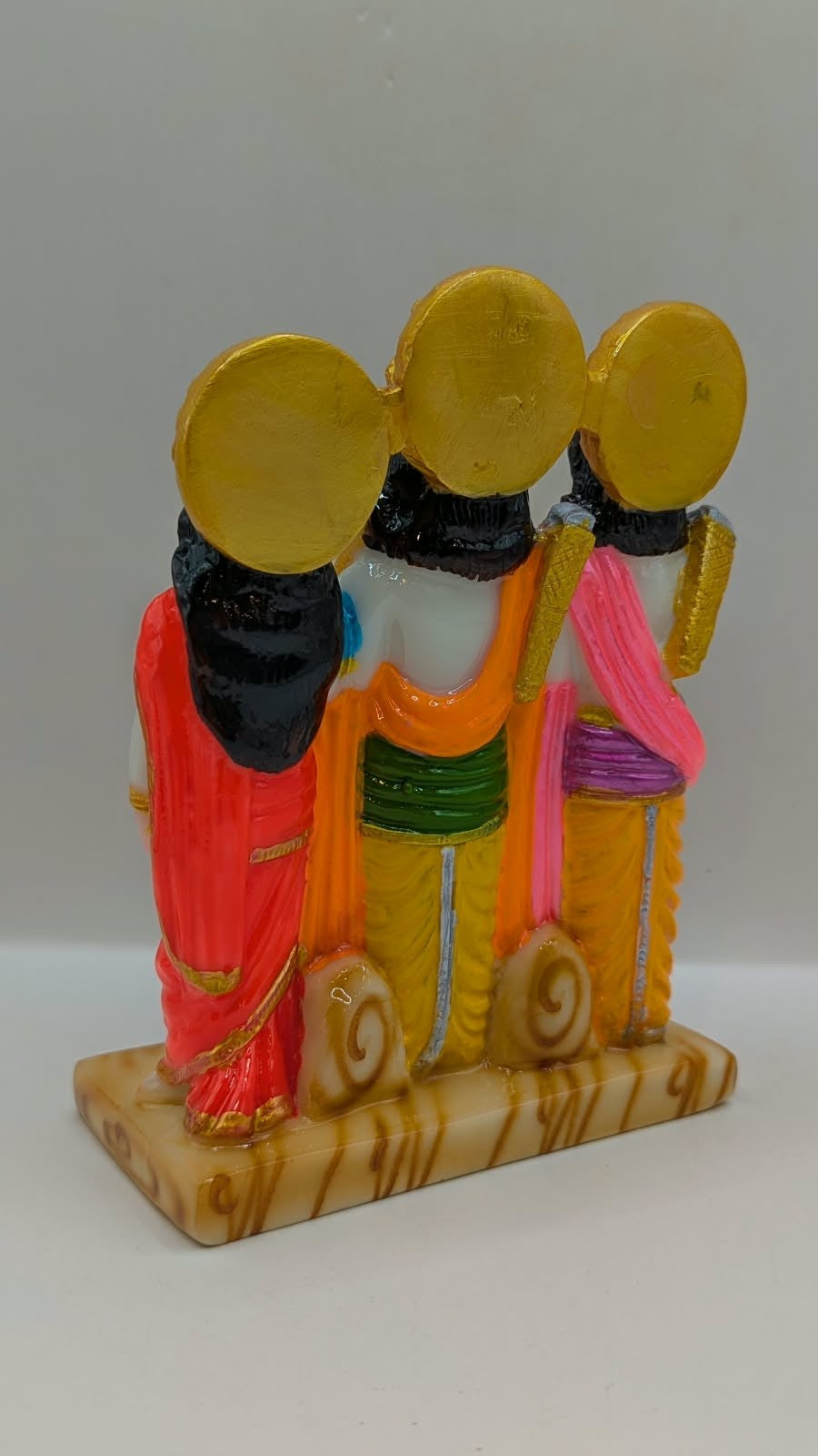 White and gold Ram Darbar resin statue, back view
