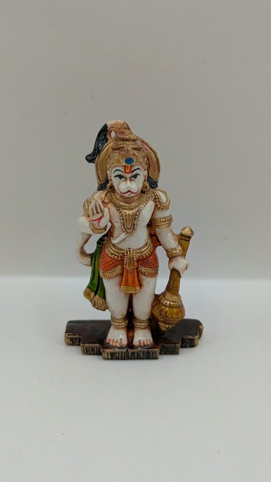 Green and orange standing Hanuman resin statue, front view