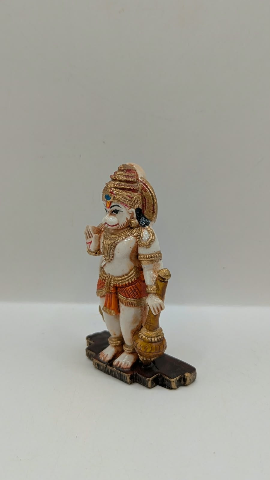 Green and orange standing Hanuman resin statue, other side view