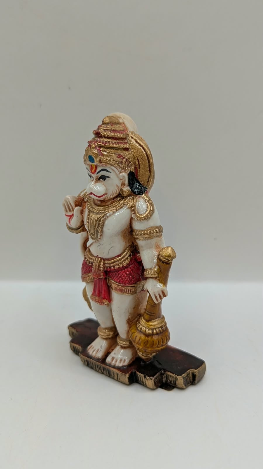 Red and gold standing Hanuman resin statue, other side view