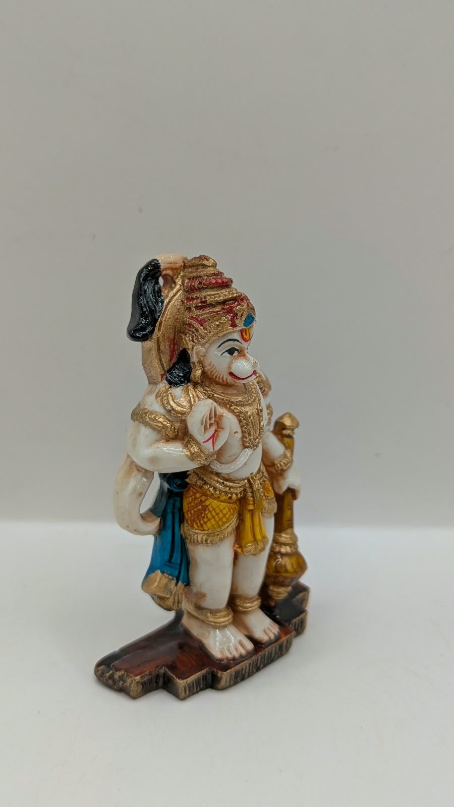 Blue and yellow standing Hanuman resin statue, other side view
