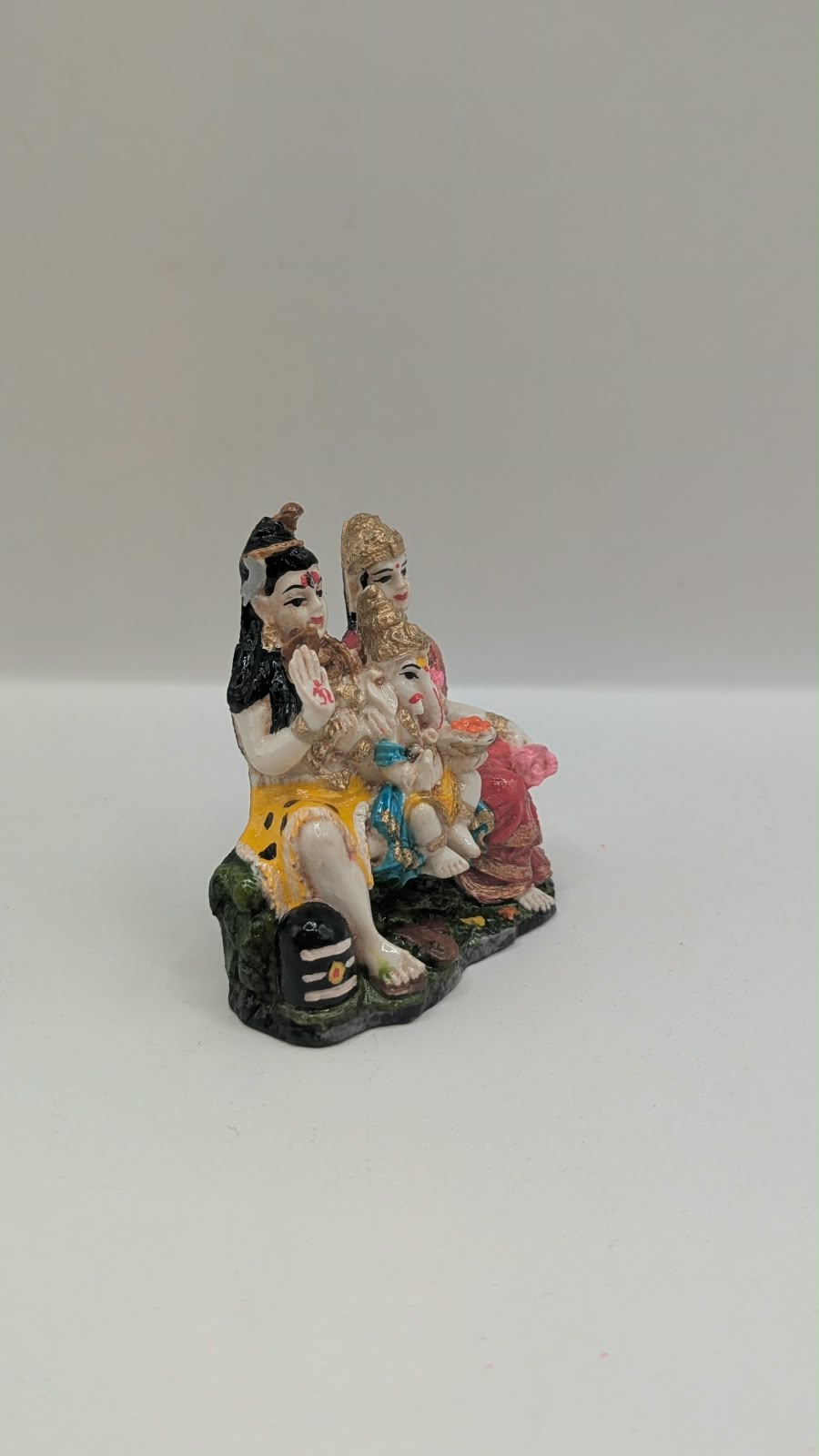 Colourful Shiv Parivar resin statue, side view