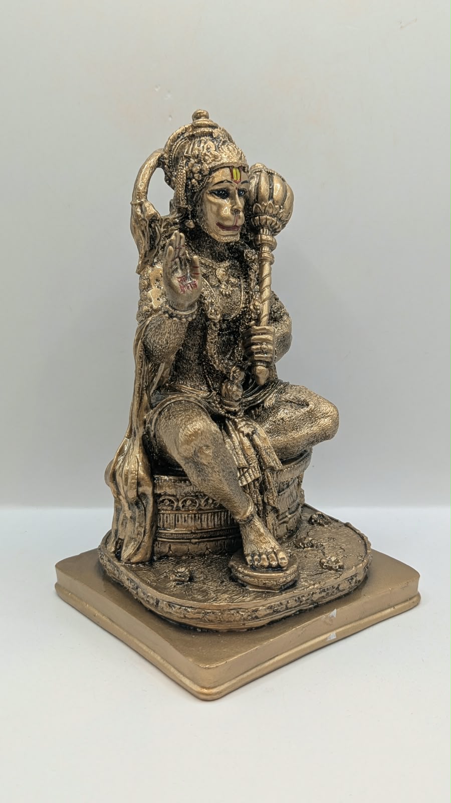 Antique bronze seated Hanuman resin statue, side view