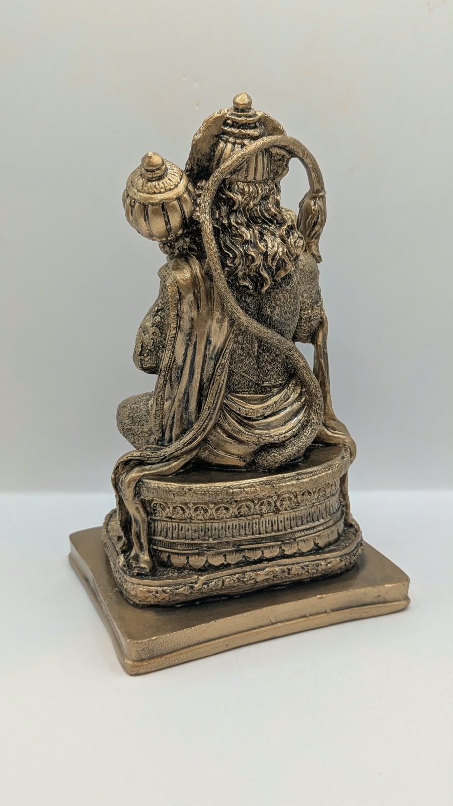 Antique bronze seated Hanuman resin statue, back view