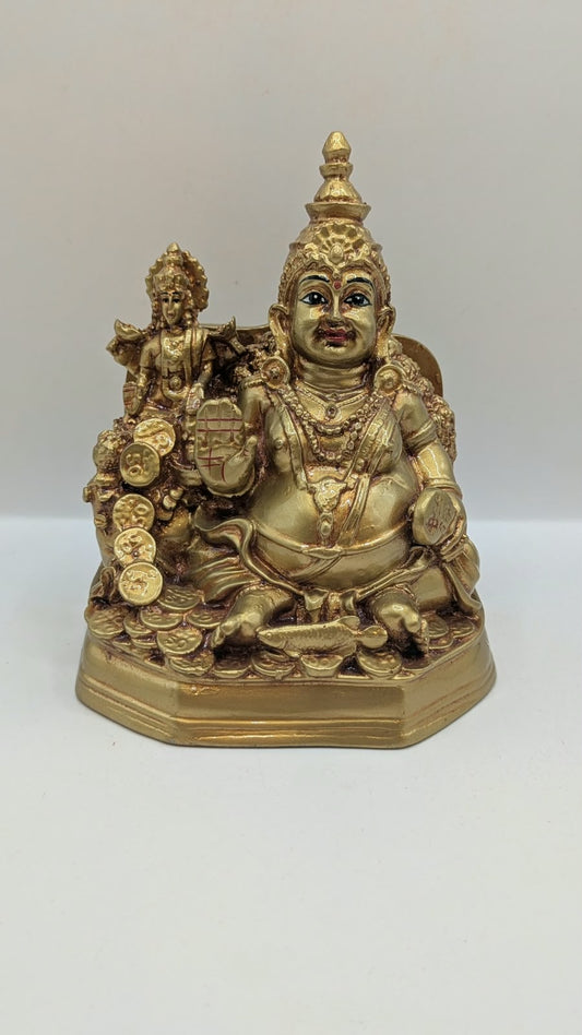 Gold Kuber statue with Laxmi, front view