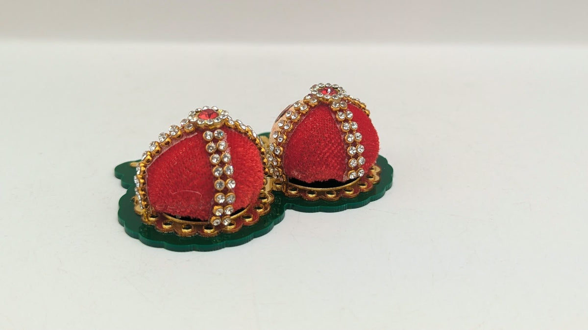 Riddhi Siddhi faces on green base, back view
