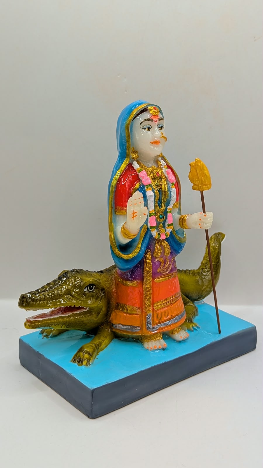 Colourful Khodiyar Maa statue, side view