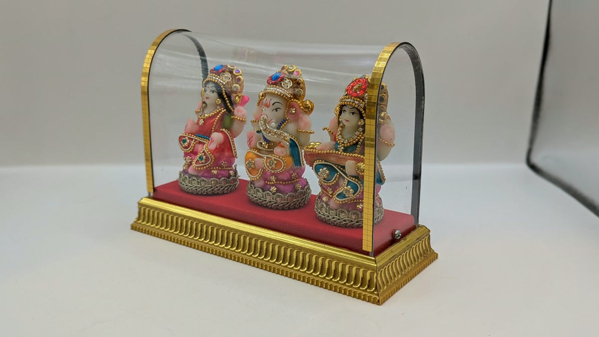 Lakshmi Ganesh Saraswati set in clear case, other side view