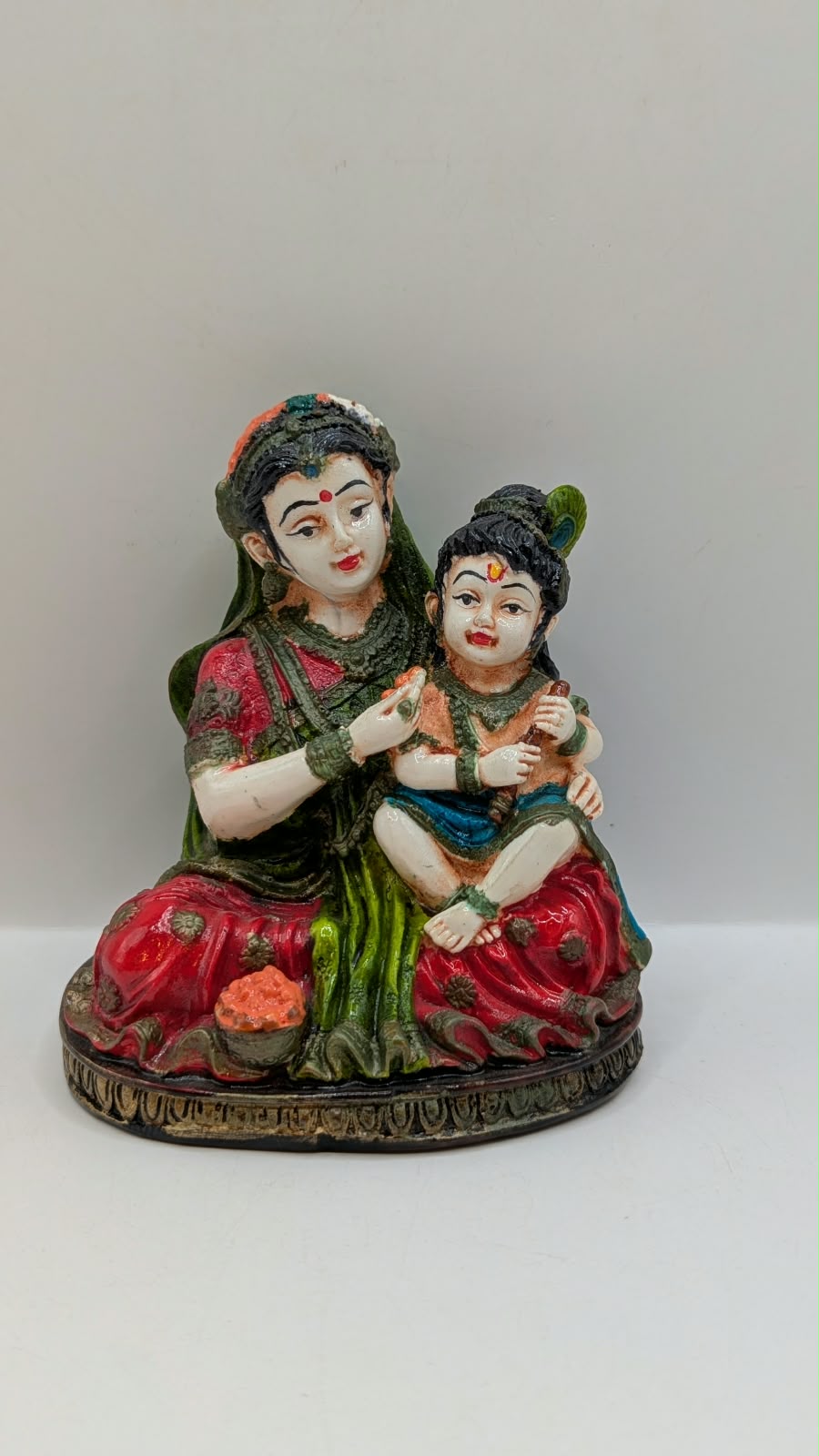 Colourful Yashoda Krishna statue, front view