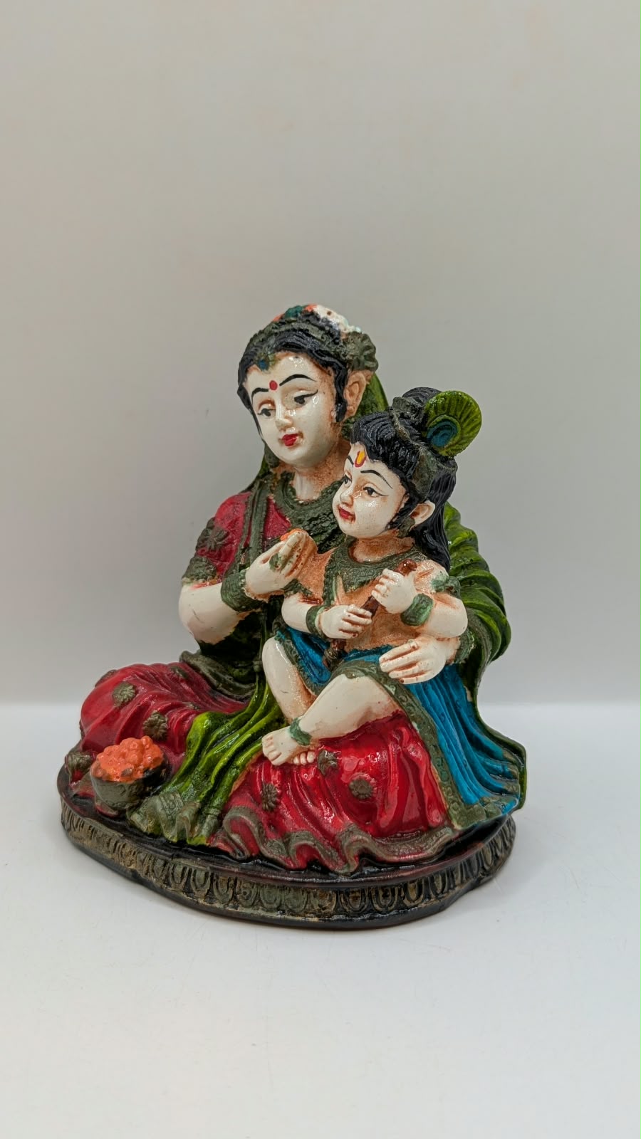 Colourful Yashoda Krishna statue, other side view