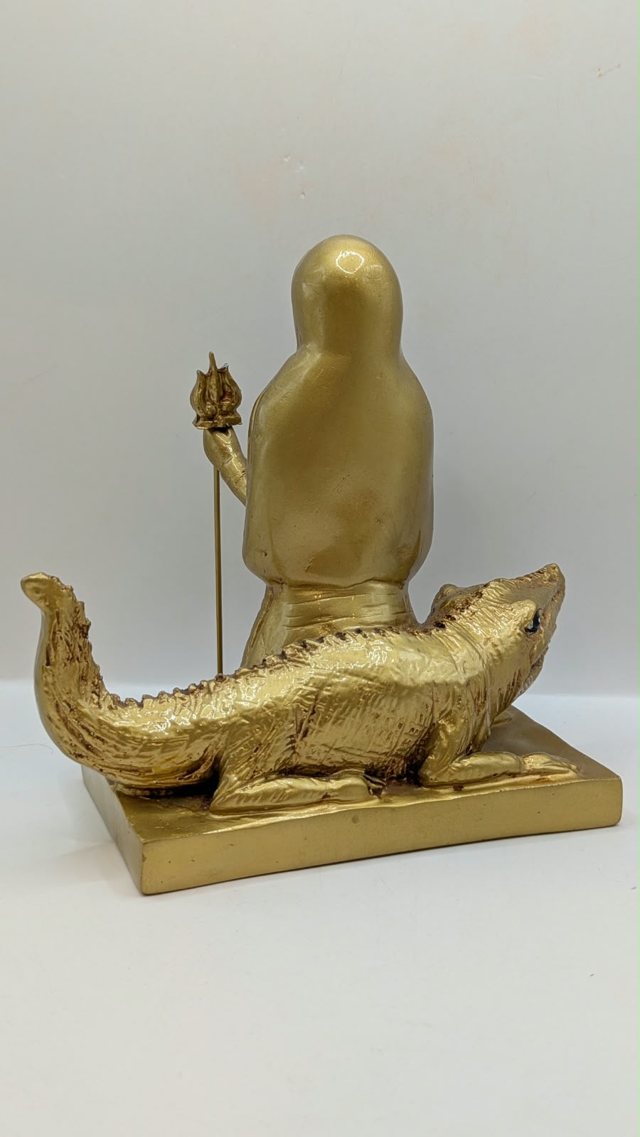 Gold Khodiyar Maa statue, back view