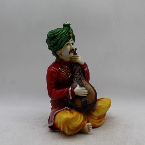 Rajasthani boy,Rajasthani man,Musician man Rajasthani statue, idol Red color