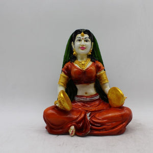 Rajasthani Girl,Rajasthani lady,Musician girl Rajasthani statue,idolOrange color