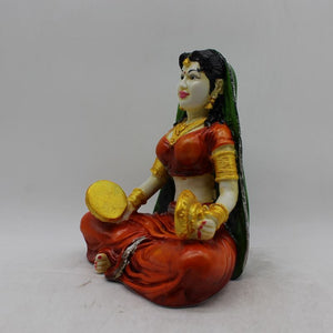 Rajasthani Girl,Rajasthani lady,Musician girl Rajasthani statue,idolOrange color