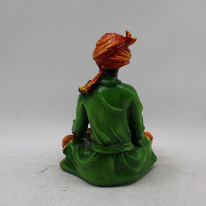Rajasthani boy,Rajasthani man,Musician man Rajasthani statue, idol Green color
