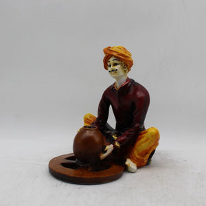 Rajasthani boy,Rajasthani man,Musician man Rajasthani statue, idol Maroon color