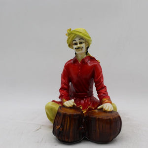 Rajasthani boy,Rajasthani man,Musician man Rajasthani statue, idol Red color